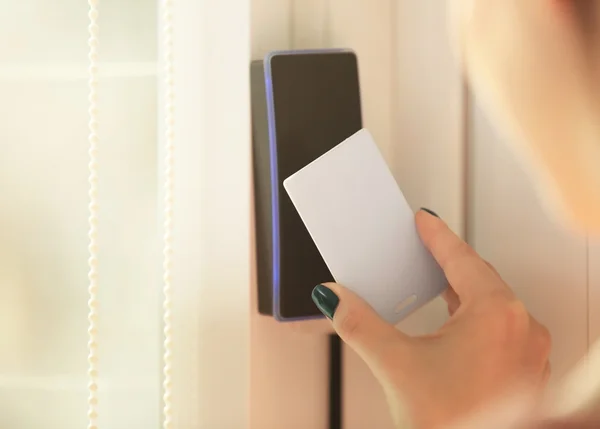 Woman setting security system — Stock Photo, Image