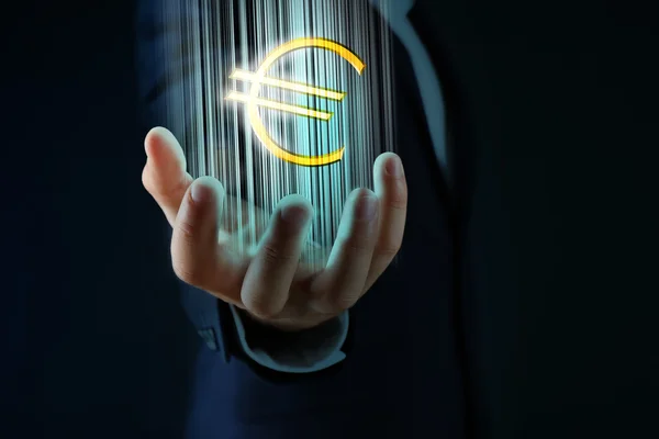 Businessman showing euro sign — Stock Photo, Image