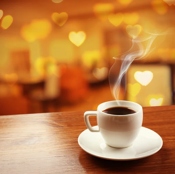 Cup of coffee on table — Stock Photo, Image