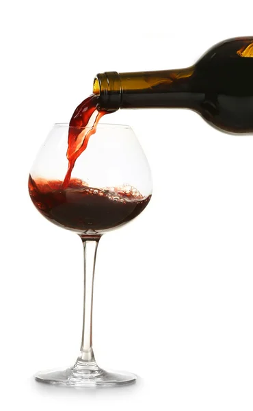 Red wine pouring in glass, isolated on white — Stock Photo, Image