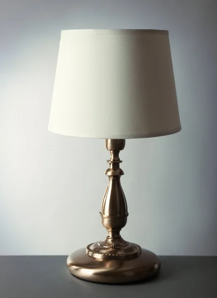 Table lamp on gray — Stock Photo, Image