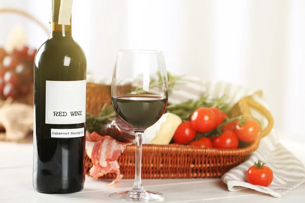 Glass of wine with food — Stock Photo, Image