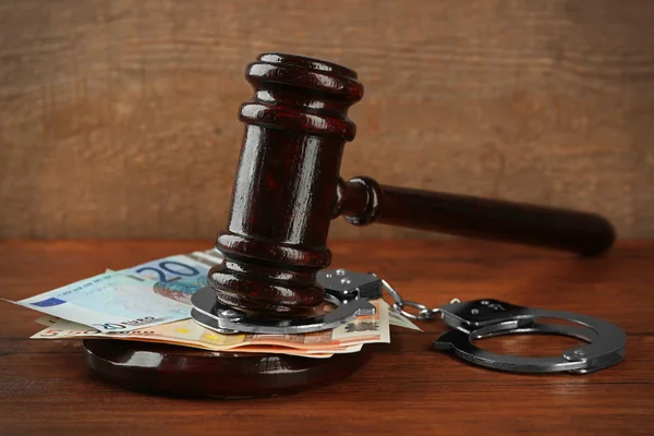 Law gavel with euro and handcuffs — Stock Photo, Image