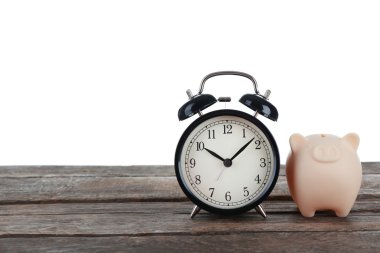 Sarı kumbara ve saat 