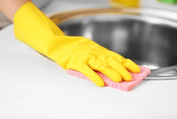 Female hand with sponge — Stock Photo, Image