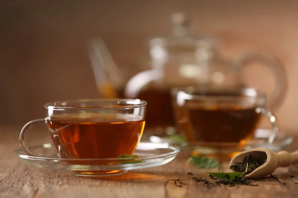 Cups of tea on wooden table — Stock Photo, Image