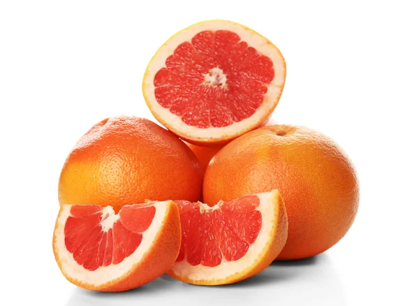 Куча грейпфрутов на белом фоне — стоковое фото