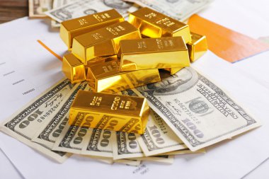 Altın külçelerini Doları banknot ile