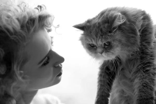 Young woman and cat