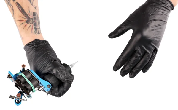 Tattooist hands in black gloves — Stock Photo, Image