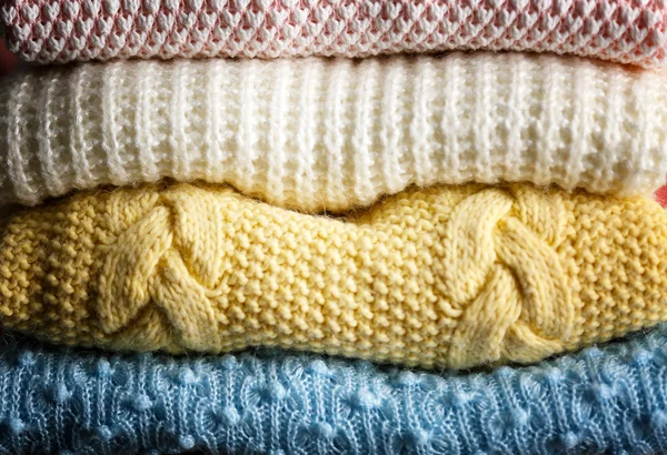 Stack of knitted clothes — Stock Photo, Image