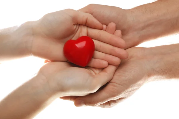 Heart in female and male hands — Stock Photo, Image