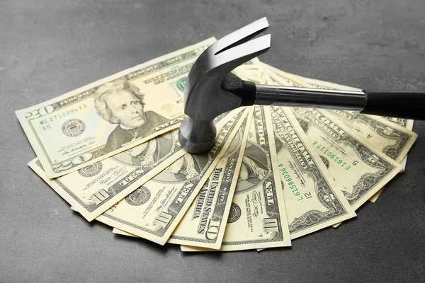 Money with hammer, close up — Stock Photo, Image