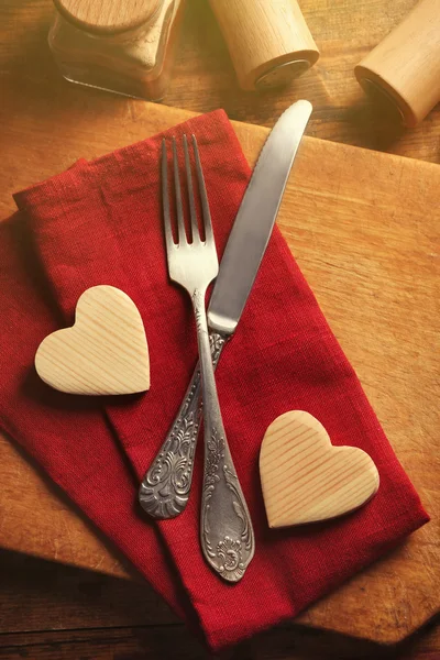 Composition of fork, knife, napkin — Stock Photo, Image