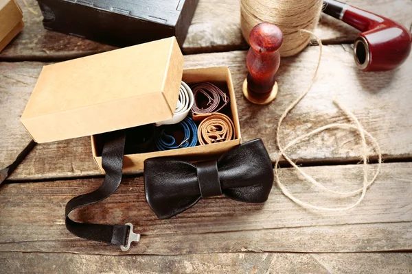 Bow tie on wooden table — Stock Photo, Image