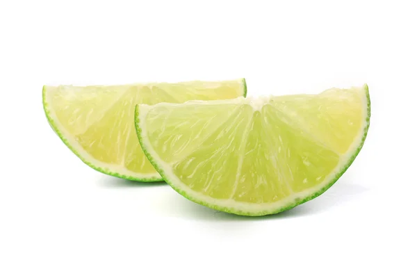 Slices of lime, isolated on white — Stock Photo, Image