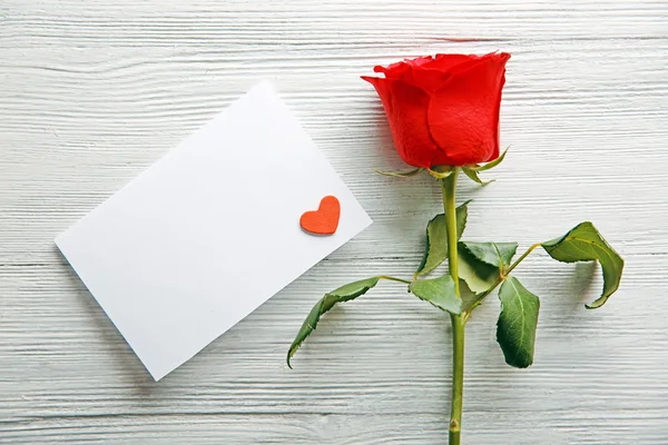 Beautiful rose with gift card — Stock Photo, Image