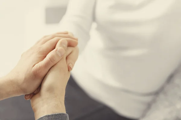 Man and woman holding hands closeup — Stock Photo, Image