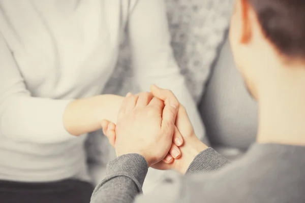 Man and woman holding hands closeup — Stock Photo, Image