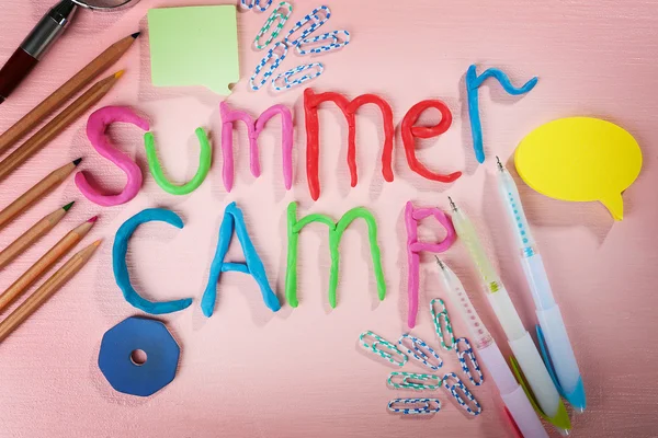 Inscription SUMMER CAMP of colorful stationery — Stock Photo, Image