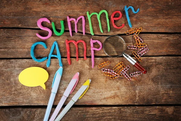 Inscription SUMMER CAMP of colorful stationery — Stock Photo, Image