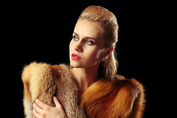 Young woman with luxury fur — Stock Photo, Image