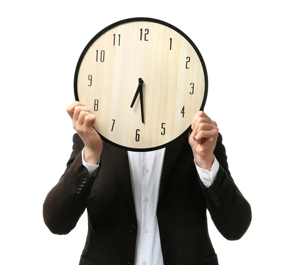 Man in suit covering face with clock — Stock Photo, Image