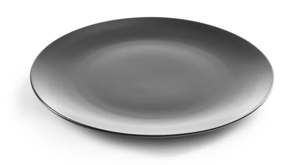 Kerek fekete kerámia tányér, elszigetelt fehér — Stock Fotó