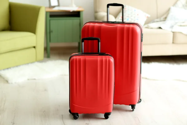 Large red polycarbonate suitcases, close up — Stock Photo, Image