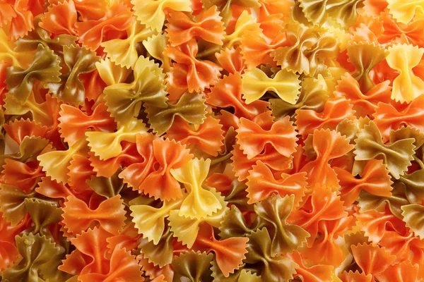 Colorful dry pasta background, close up — Stock Photo, Image