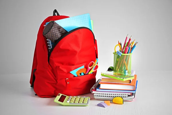 Backpack with school supplies — Stock Photo, Image