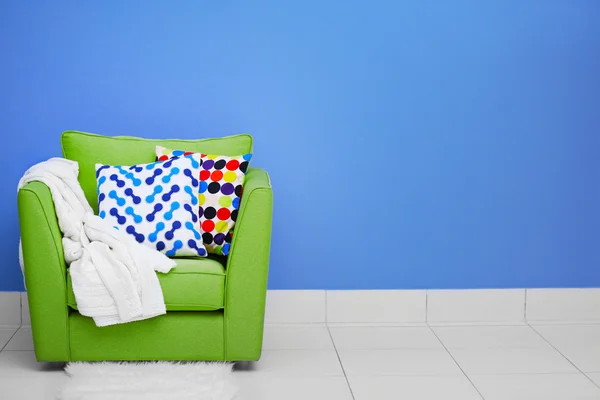 Comfortable armchair with pillows — Stock Photo, Image