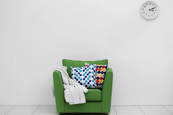 Comfortable armchair with pillows — Stock Photo, Image