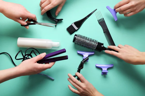 Human hands holding hairdresser set — Stock Photo, Image