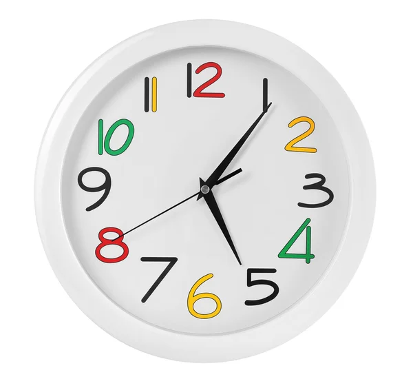 Круглий настінний годинник з різнокольоровими фігурами — стокове фото