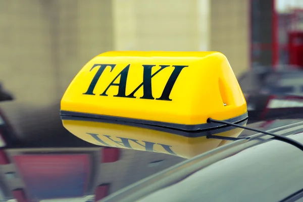 Sinal de táxi no carro — Fotografia de Stock