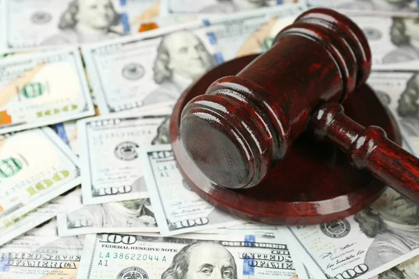 Law gavel on dollars — Stock Photo, Image