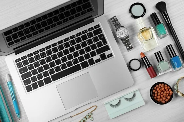 Laptop with woman's accessories — Stock Photo, Image