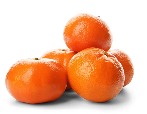 A pile of fresh tangerines isolated on white background, close up — Stock Photo, Image