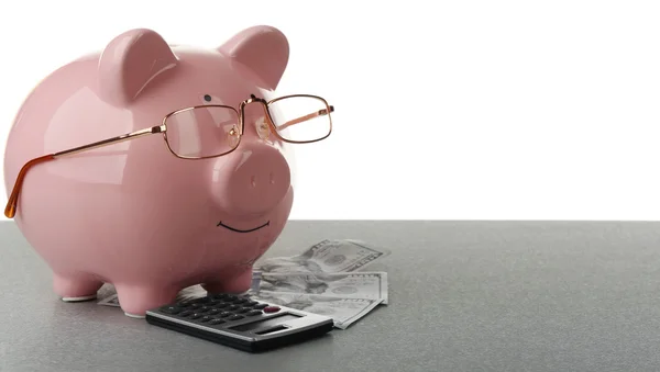 Rosa Sparschwein mit Dollarnoten — Stockfoto