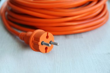 Turuncu uzantısı üzerinde ahşap yüzey closeup haddelenmiş.