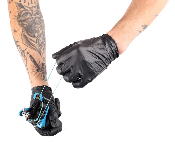 Tattooist ruce v černé rukavice — Stock fotografie
