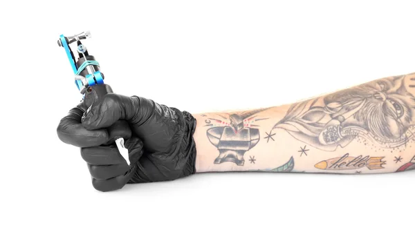 Mano tatuadora en guante negro — Foto de Stock