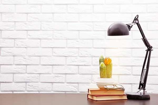 Modern lamp and books — Stock Photo, Image