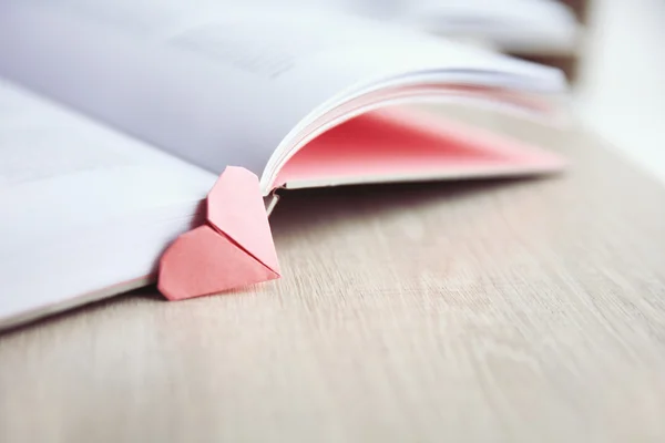 Book and heart shaped bookmark — Stock Photo, Image