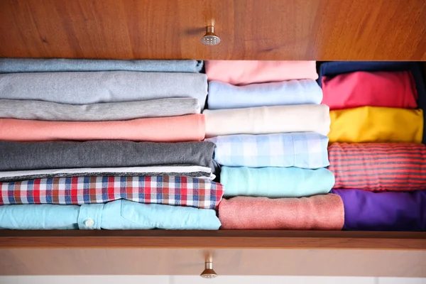 Neatly folded clothes — Stock Photo, Image