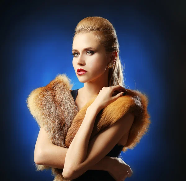Blonde girl wearing fur — Stock Photo, Image