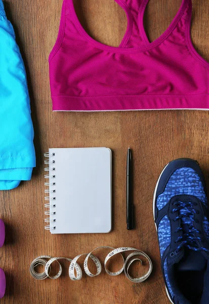 Atleet set met vrouwelijke kleding — Stockfoto