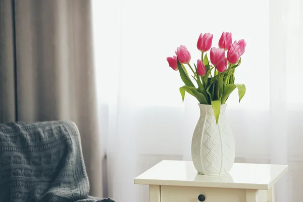 Pink tulips in a vase — Stock Photo, Image