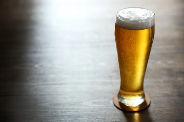 Glass of light beer — Stock Photo, Image